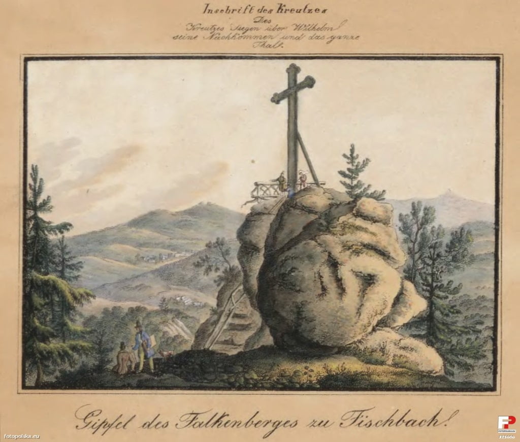 stara fotografia góra a na niej żelazny krzyż