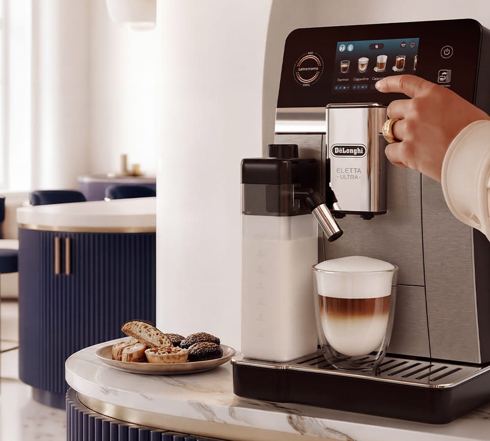 Alt 3 zdjęcia w tle: robienie café con leche w ekspresie Delonghi Eletta Ultra - zdjęcie
Źródło: materiały klienta
